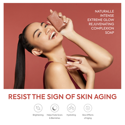 Woman applying Makari Naturalle Intense Extreme Glow Rejuvenating Complexion Soap to her face with text about skin care benefits on a red background
