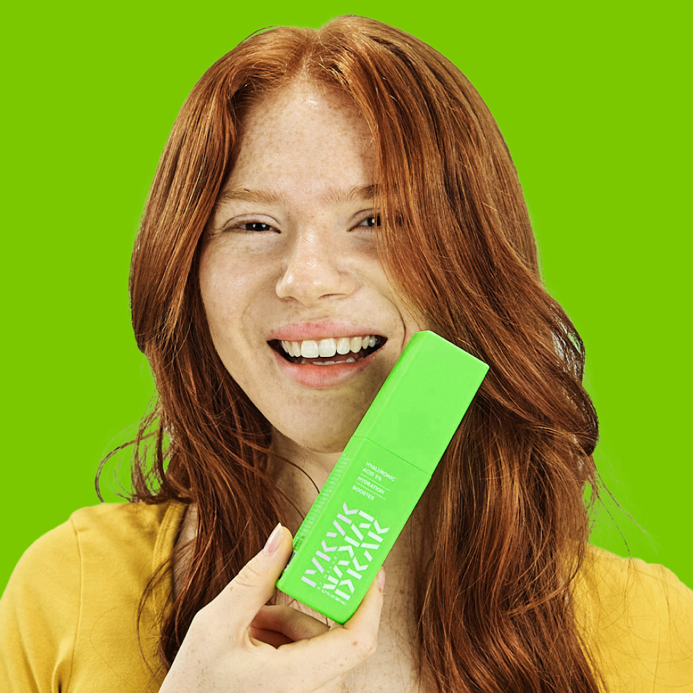 Person holding a Makari IYKYK Hyaluronic Acid 2% Hydration Booster