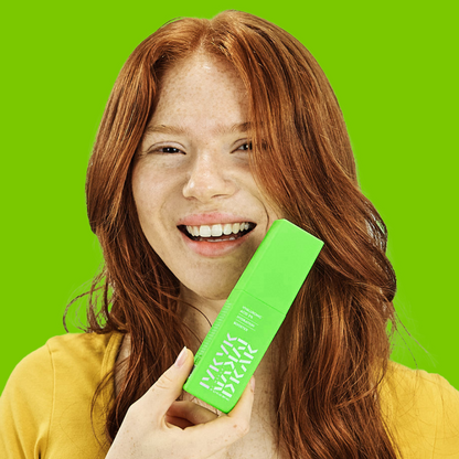 Person holding a Makari IYKYK Hyaluronic Acid 2% Hydration Booster