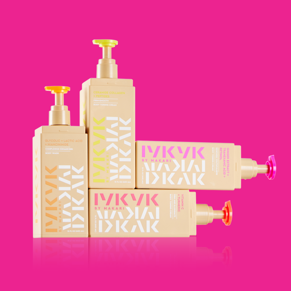 Set of hair care products with pump dispensers on a pink background