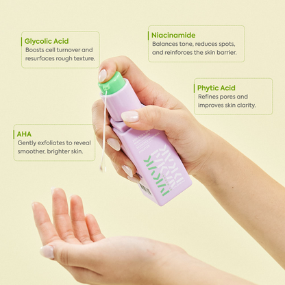 Hand holding a skincare product with text about ingredients on a light yellow background